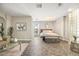 Spacious bedroom with sitting area, large window and natural light at 2818 E Quail Ave, Las Vegas, NV 89120