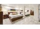 Bright bedroom featuring two beds, unique artwork and stylish furniture at 2818 E Quail Ave, Las Vegas, NV 89120