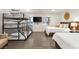 Spacious bedroom features two beds, a bunk bed and a television at 2818 E Quail Ave, Las Vegas, NV 89120