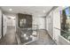 Hallway with glass railing and natural light and open concept at 2818 E Quail Ave, Las Vegas, NV 89120