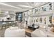 Open-concept living room showcasing modern design elements and abundant natural light at 2818 E Quail Ave, Las Vegas, NV 89120