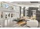 Bright and airy living room with high ceilings, balcony, and large windows offering ample natural light at 2818 E Quail Ave, Las Vegas, NV 89120
