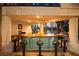 Outdoor bar area with seating and a unique tile countertop at 2818 E Quail Ave, Las Vegas, NV 89120