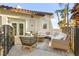 Relaxing patio area with comfortable seating and lush landscaping at 2818 E Quail Ave, Las Vegas, NV 89120