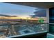 Enjoy sunsets and skyline views from this condo's balcony with modern glass railings and relaxing seating at 4525 Dean Martin Dr # 2800, Las Vegas, NV 89103
