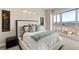 Bright bedroom features a large window with expansive city views at 4525 Dean Martin Dr # 2800, Las Vegas, NV 89103