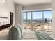 Modern bedroom boasts a stunning city view through large windows, creating a serene atmosphere at 4525 Dean Martin Dr # 2800, Las Vegas, NV 89103