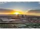 Golden sunset illuminates Las Vegas skyline, seen from a balcony with a stunning mountain backdrop at 4525 Dean Martin Dr # 2800, Las Vegas, NV 89103