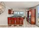 Modern kitchen with stainless steel appliances, dark countertops, breakfast bar, and city views at 4525 Dean Martin Dr # 2800, Las Vegas, NV 89103