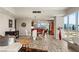 Spacious living room and dining area with wood floors and floor-to-ceiling windows boasting city views at 4525 Dean Martin Dr # 2800, Las Vegas, NV 89103