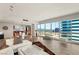 Open living space featuring bright lighting and views of the city at 4525 Dean Martin Dr # 2800, Las Vegas, NV 89103
