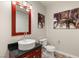 Modern powder room with vessel sink, updated fixtures and unique wall art at 4525 Dean Martin Dr # 2800, Las Vegas, NV 89103