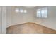 This bedroom is carpeted and has natural light from a large window at 612 Bullwhip Ct, Henderson, NV 89011