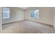 Spacious bedroom with neutral carpet and bright windows at 612 Bullwhip Ct, Henderson, NV 89011