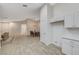 Open-concept living area with dining space and tile flooring at 612 Bullwhip Ct, Henderson, NV 89011