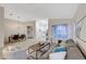Spacious open-concept living room flows seamlessly into the dining and kitchen areas for easy living at 612 Bullwhip Ct, Henderson, NV 89011