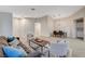 Open-concept living and dining area features neutral tones and stylish furnishings, perfect for entertaining at 612 Bullwhip Ct, Henderson, NV 89011