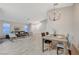 Open-concept living space with dining area features stylish decor and plenty of natural light at 612 Bullwhip Ct, Henderson, NV 89011