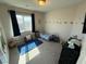 Playful room with bright accents, stuffed animals, and cozy reading nook at 7068 Parrot Bay Way, Las Vegas, NV 89118
