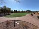 Community dog park featuring brick walkways, open green space and lush landscaping in a Gathering-friendly neighborhood at 7068 Parrot Bay Way, Las Vegas, NV 89118
