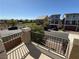 Neighborhood view from balcony, showing street, park, and surrounding houses at 7068 Parrot Bay Way, Las Vegas, NV 89118