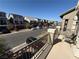 Street view with view from the property balcony at 7068 Parrot Bay Way, Las Vegas, NV 89118