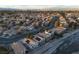 Panoramic aerial showcasing a neighborhood with well-maintained streets and desert landscaping at 8072 Big Top Dr, Las Vegas, NV 89123