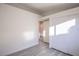 Bedroom has a closet and gray floors at 8072 Big Top Dr, Las Vegas, NV 89123