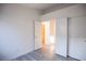 A sun-filled bedroom featuring modern floors, closet, and an entrance to another room at 8072 Big Top Dr, Las Vegas, NV 89123
