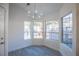 Dining room features a modern chandelier and natural light at 8072 Big Top Dr, Las Vegas, NV 89123