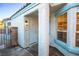 Covered entry featuring a classic white door and natural light at 8072 Big Top Dr, Las Vegas, NV 89123