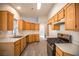 View of the kitchen featuring gas range and ample cabinets and counter space at 8072 Big Top Dr, Las Vegas, NV 89123