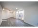 Inviting living area with bright white walls, modern flooring, and many windows at 8072 Big Top Dr, Las Vegas, NV 89123