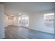 Freshly painted living room with lots of windows and a door at 8072 Big Top Dr, Las Vegas, NV 89123