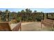 Ornate balcony with decorative wrought iron railing and two chairs overlooking lush greenery at 9101 Alta Dr # 11, Las Vegas, NV 89145
