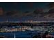 Expansive twilight cityscape view from building showing many lights and clouds at 9101 Alta Dr # 11, Las Vegas, NV 89145