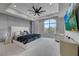 This primary bedroom features a large window, a ceiling fan, a modern style, and a beautiful view at 9101 Alta Dr # 11, Las Vegas, NV 89145