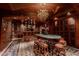 Exquisite wine room boasts a marble table, abundant storage, and decorative tile flooring at 9101 Alta Dr # 11, Las Vegas, NV 89145