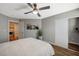 Cozy bedroom with a sliding closet door, and a connecting laundry room at 9601 Rolling Thunder Ave, Las Vegas, NV 89148