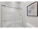 Bathroom featuring white shower with glass doors and gray walls at 1 Vicolo Bella, Henderson, NV 89011