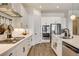 Modern kitchen with stainless steel appliances, a gas range, and a large center island for food preparation at 10064 Ocher Valley Ave, Las Vegas, NV 89178