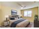 Well-lit main bedroom with large bed, side tables, and an inviting color scheme at 1016 Wannamaker Way, Henderson, NV 89015