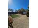 Backyard with xeriscaping, landscaping, storage building, and a new irrigation system at 10215 Radcliffe Peak Ave, Las Vegas, NV 89166