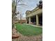 Spacious backyard featuring a lush lawn, patio, and outdoor seating area perfect for relaxing at 10220 Radcliffe Peak Ave, Las Vegas, NV 89166