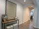 Bright hallway with stylish decor, hardwood floors, and arched doorways at 10220 Radcliffe Peak Ave, Las Vegas, NV 89166