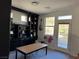 Office featuring neutral countertops with dark wood cabinets and tile floors at 10220 Radcliffe Peak Ave, Las Vegas, NV 89166