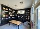 Office featuring neutral countertops with dark wood cabinets and tile floors at 10220 Radcliffe Peak Ave, Las Vegas, NV 89166