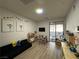 playroom with lots of natural light from the sliding glass door to the backyard patio at 10220 Radcliffe Peak Ave, Las Vegas, NV 89166