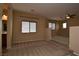 Spacious bonus room with neutral carpet, open windows, and standard ceiling fan at 10511 Loma Portal Ave, Las Vegas, NV 89166