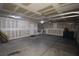 Three car garage featuring insulated doors and ample workspace at 10511 Loma Portal Ave, Las Vegas, NV 89166